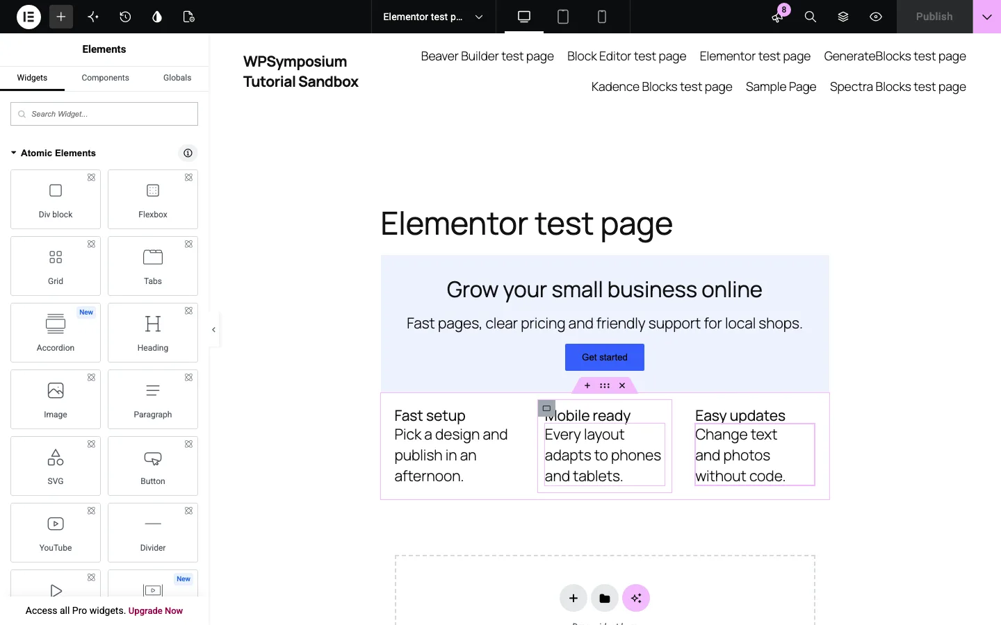 The Elementor 4.3.3 editor with the Atomic Elements panel on the left and the finished hero and three-column features section in the canvas
