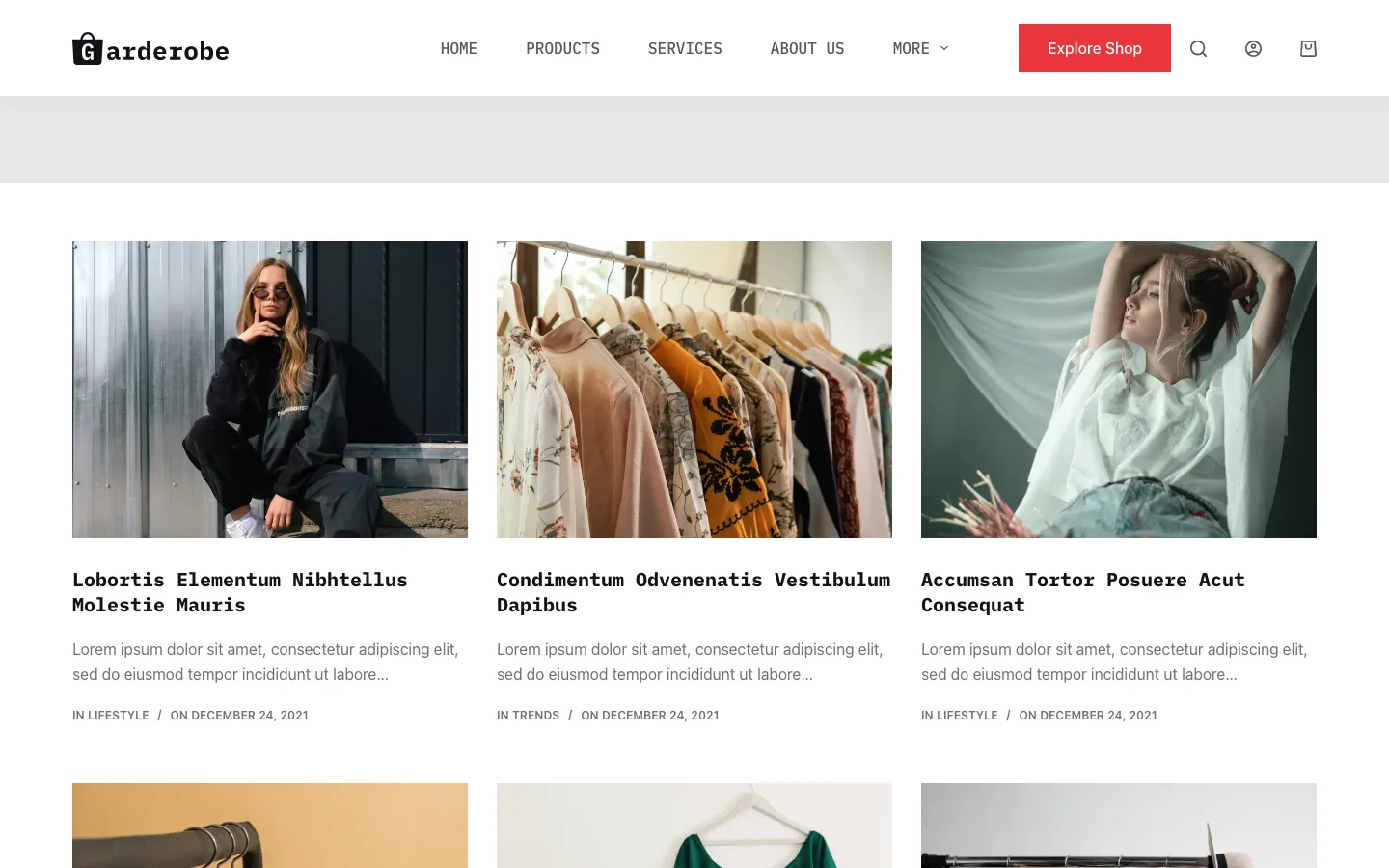 Blog page of the Garderobe site on Blocksy using the Grid layout, with three posts per row showing a photo, title, excerpt and category and date