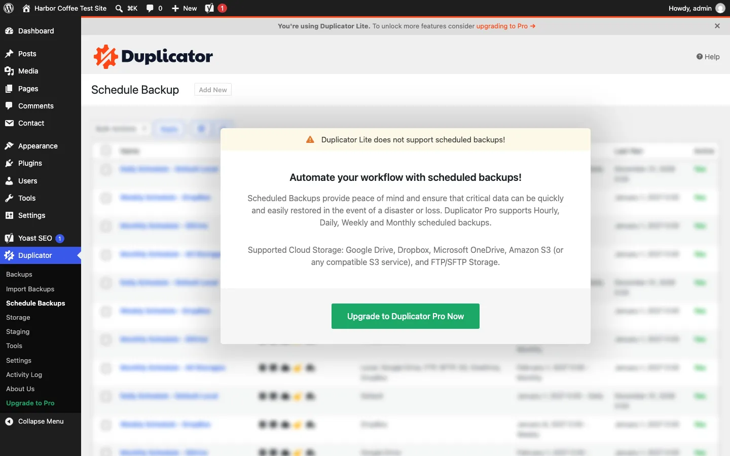 Duplicator Schedule Backup page with blurred sample schedules behind a box reading “Duplicator Lite does not support scheduled backups!” and an Upgrade to Duplicator Pro Now button