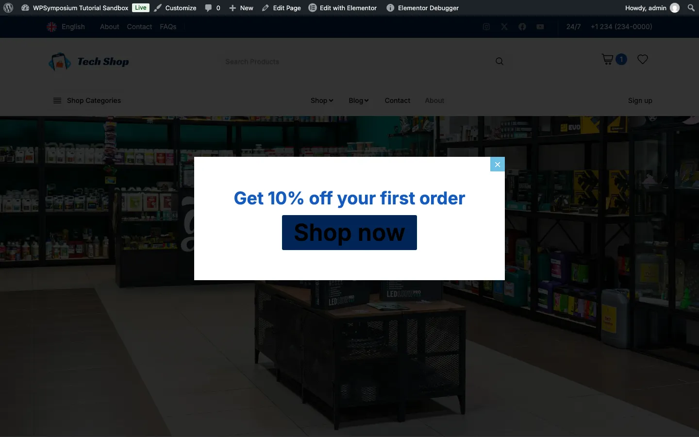 A popup reading Get 10% off your first order with a Shop now button over the darkened About page on our test install
