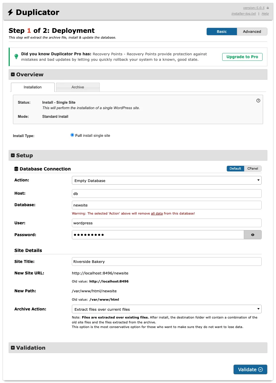 Duplicator installer step 1 of 2 with the database connection fields filled in and the new site URL detected