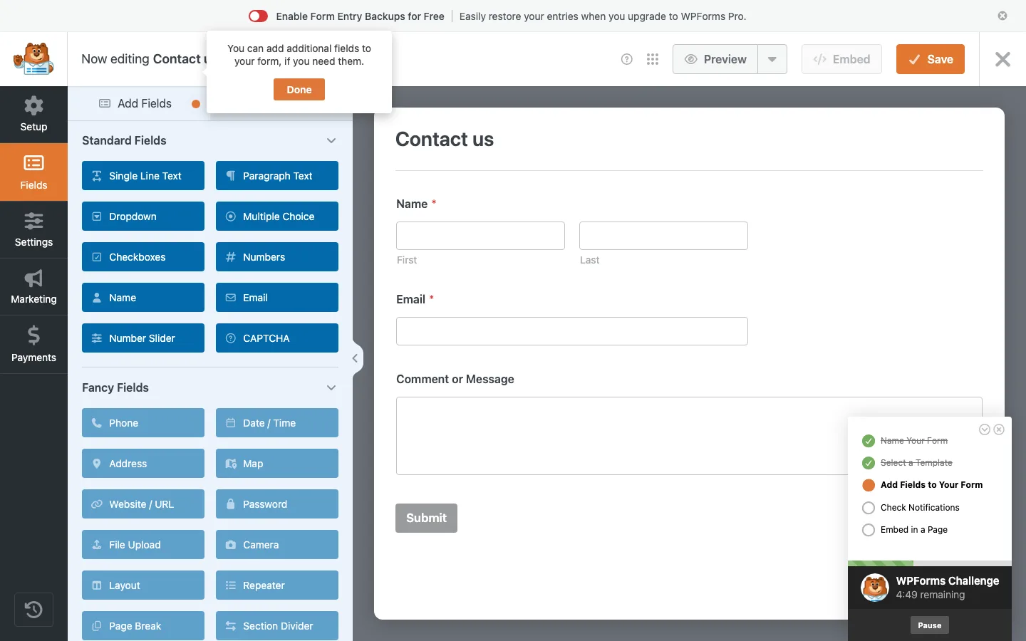 The WPForms Lite form builder with the Simple Contact Form template loaded, an entry backups banner at the top and the WPForms Challenge checklist in the corner